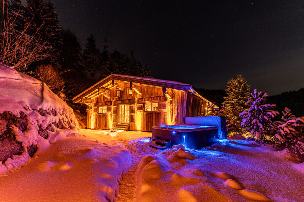Alpine Lodge Austria at night in snow
