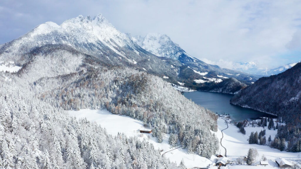 Alpine Lodge Austria in snow by lake