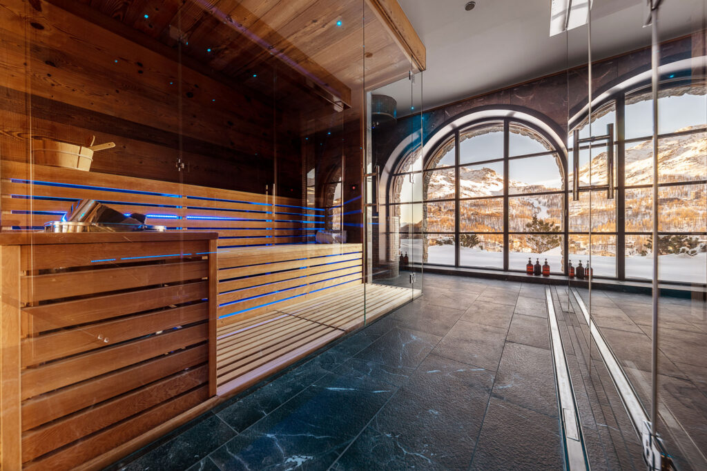 luxury italian ski chalet wellness sauna with view of mountains