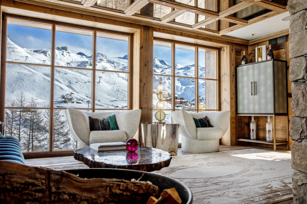 Luxury italian ski chalet looking out onto ski slopes