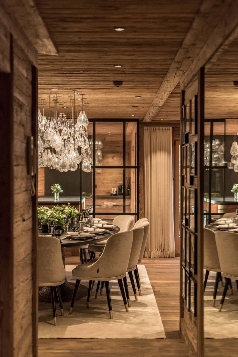 Laid dining table in luxury spa chalet Gstaad