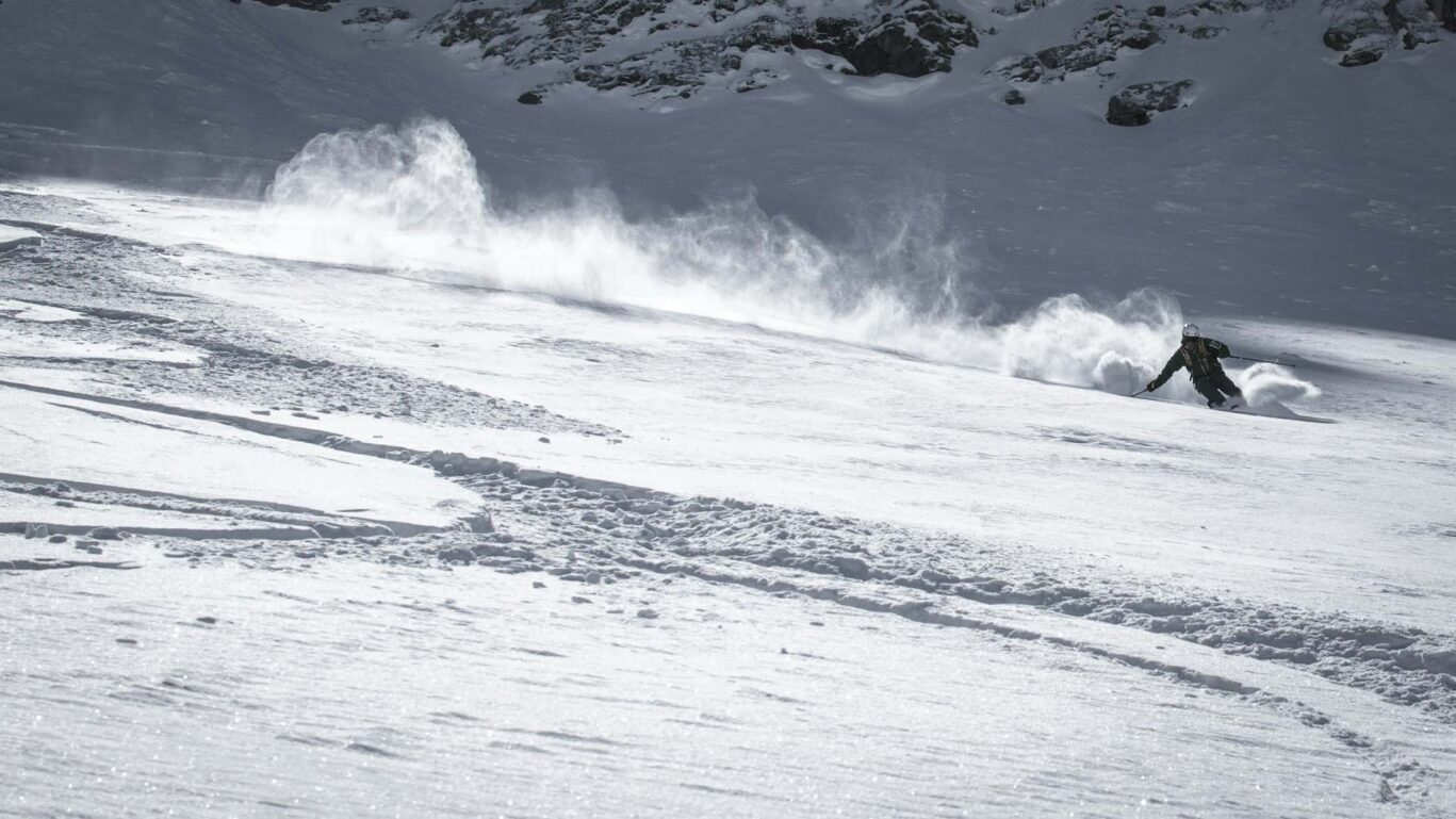 Ski touring fresh tracks experience in deep powder