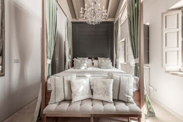 Luxury bedroom with four poster bed in Tuscany private villa