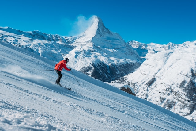 Skiing with matterhorn in the distance