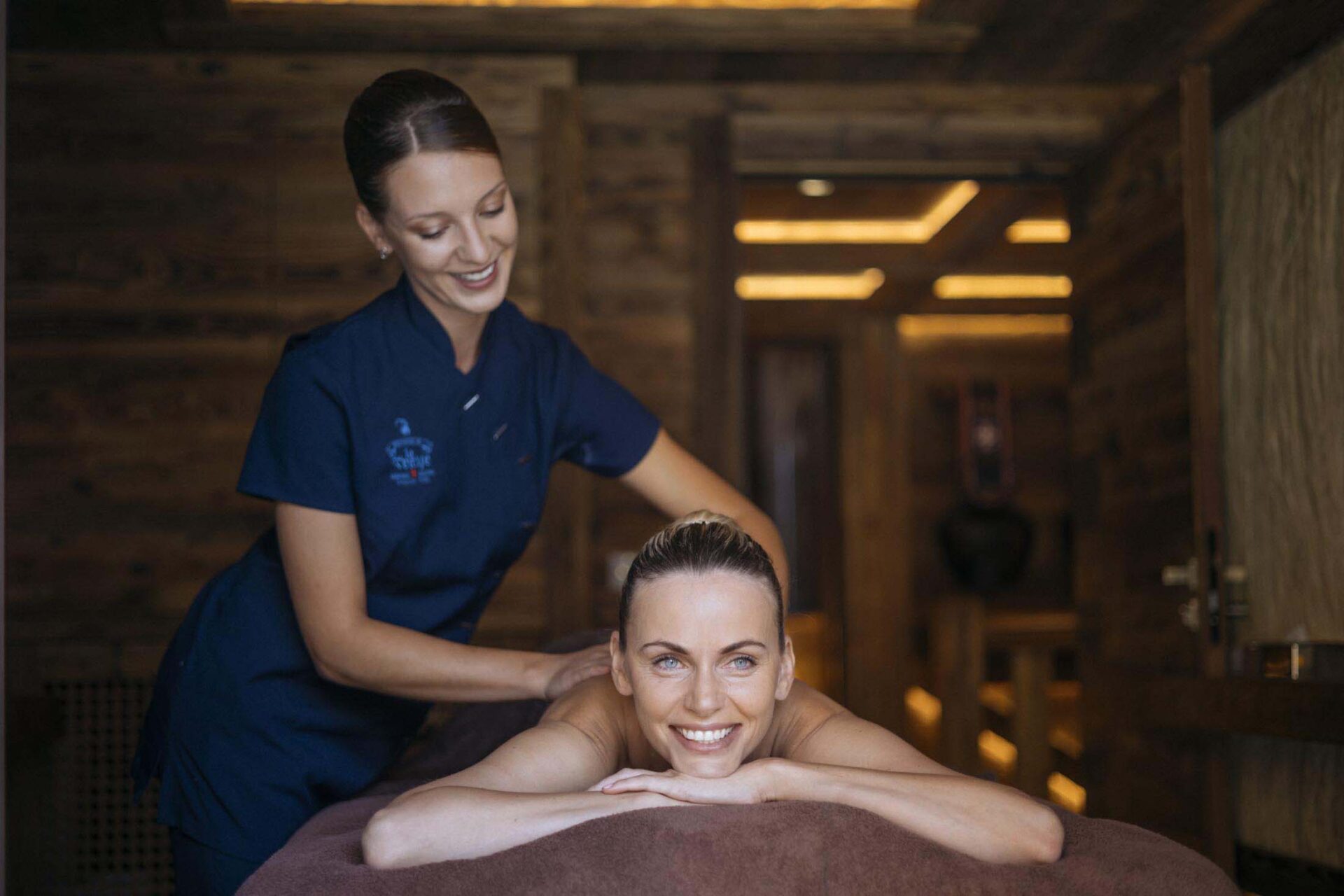 lady having massage in French alps three valleys luxury private chalet