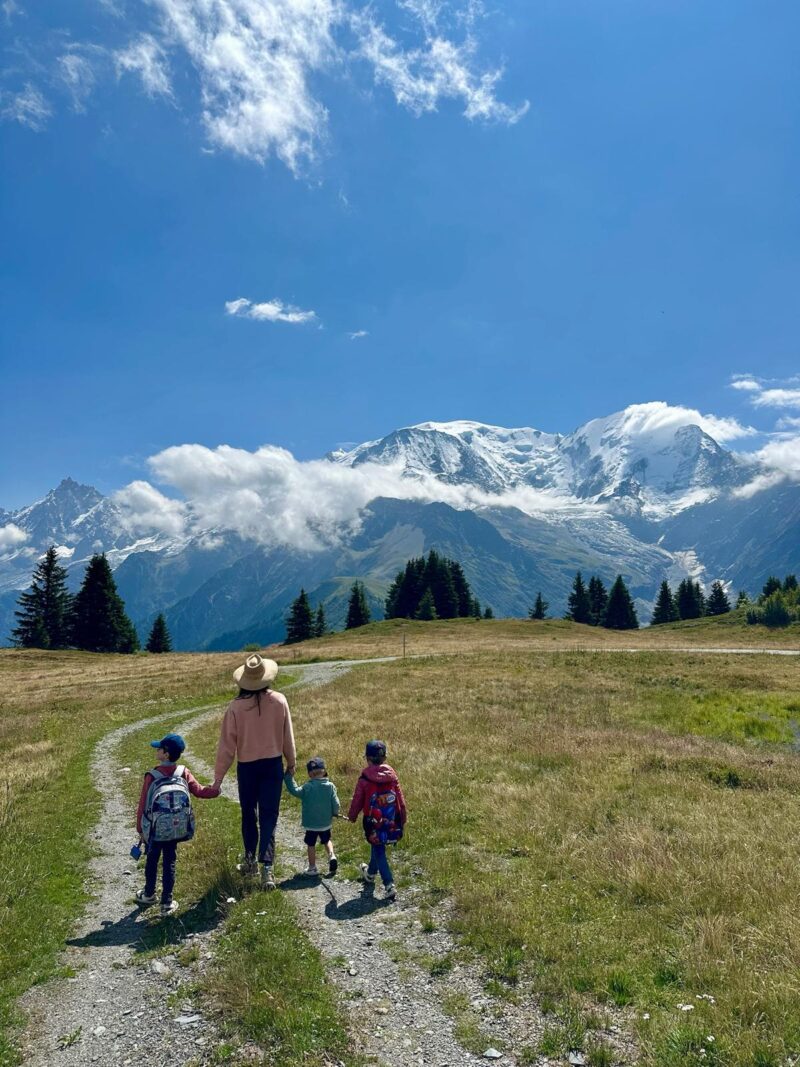 mother with 3 boys walking in chamonix Mont Blanc
